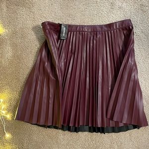 Faux leather burgundy pleated skirt